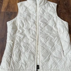 Ladies Eddie Bauer size medium cream polyester lining. Goose down filling